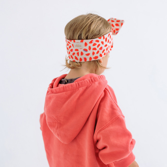 girl headband red lipstick